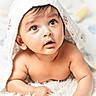 Vedh is registered to the contest to win money with this photo: baby, blanket, bodypart, bonnet, cap, clothing, crawling, face, finger, hand, happy, hat, head, hood, newborn, person, photography, portrait, smile, towel