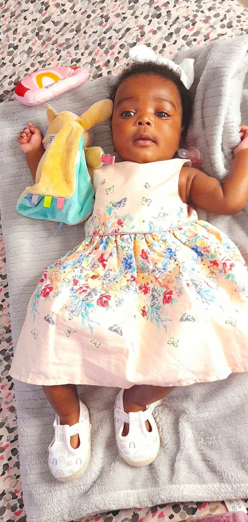 Destiny participe au concours pour gagner de l'argent avec cette photo : baby, baby_toddler_clothing, child, chin, dress, eye, fashion_design, fun, hairstyle, happy, headgear, linens, neck, pattern, person, pink, skin, sleeve, toddler, white