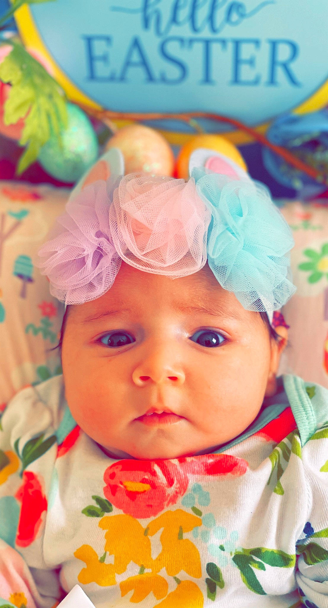 Athena is registered to the contest to win money with this photo: baby, baby_toddler_clothing, blue, cheek, child, dress, eyelash, facial_expression, fun, happy, headgear, headwear, lip, magenta, people, person, petal, pink, plant, skin