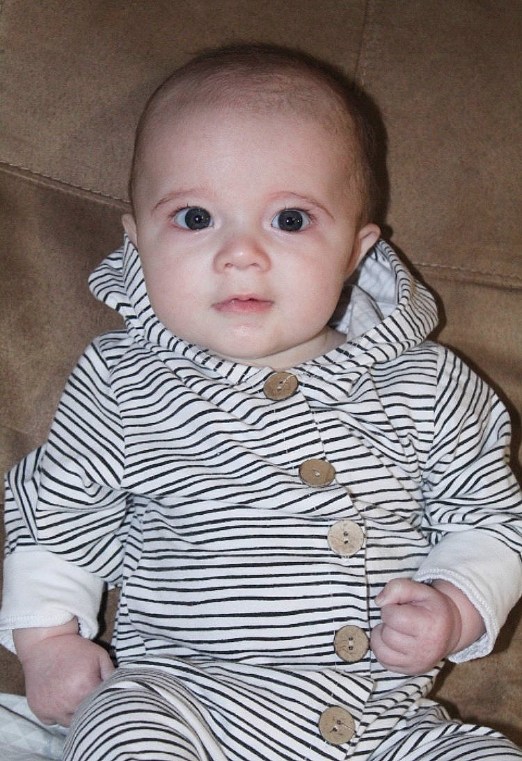 John-michael is registered to the contest to win money with this photo: baby, baby_products, baby_toddler_clothing, cheek, child, comfort, ear, eyebrow, finger, hand, iris, lip, person, portrait_photography, skin, thumb, toddler