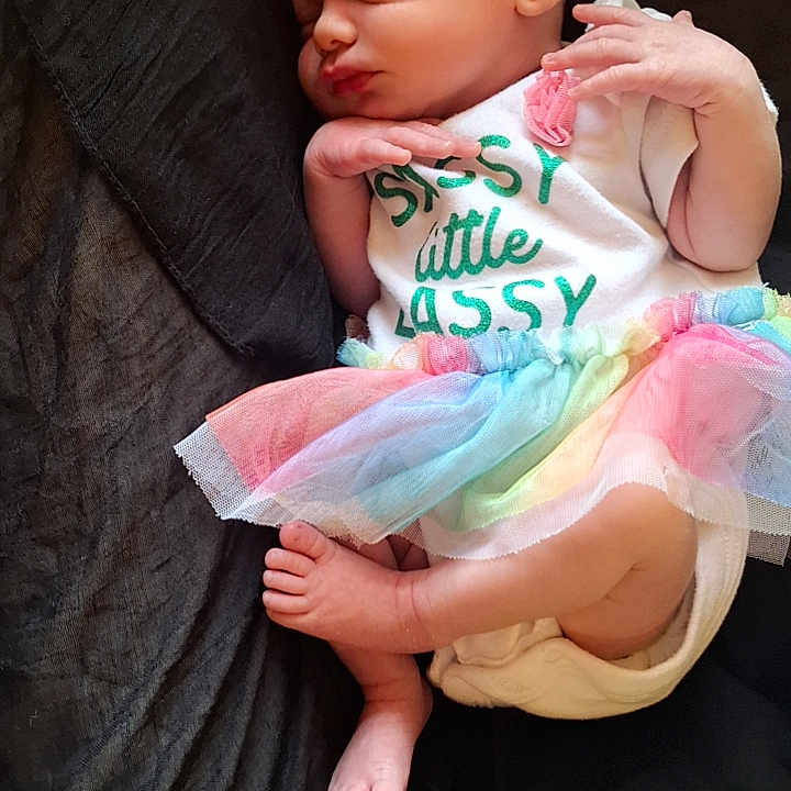 Anna'Rose is registered to the contest to win money with this photo: baby, blanket, bodypart, bonnet, clothing, couch, face, finger, furniture, hand, hat, head, newborn, person, photography, portrait, sitting, sleeping, toe