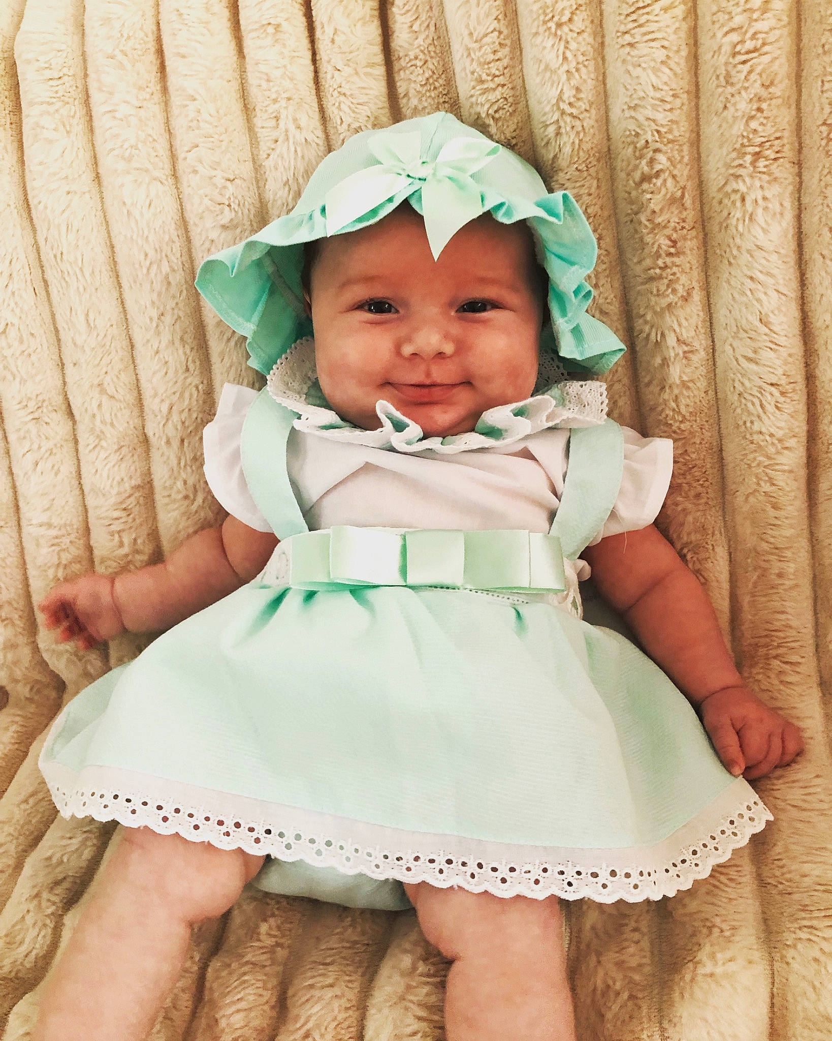 Maïvy a rejoint le concours — aidez-le/la à gagner de superbes lots ! baby, baby_products, baby_toddler_clothing, cap, child, day_dress, dress, happy, headgear, headwear, one_piece_garment, pattern, person, photograph, pink, product, skin, sleeve, smile, textile