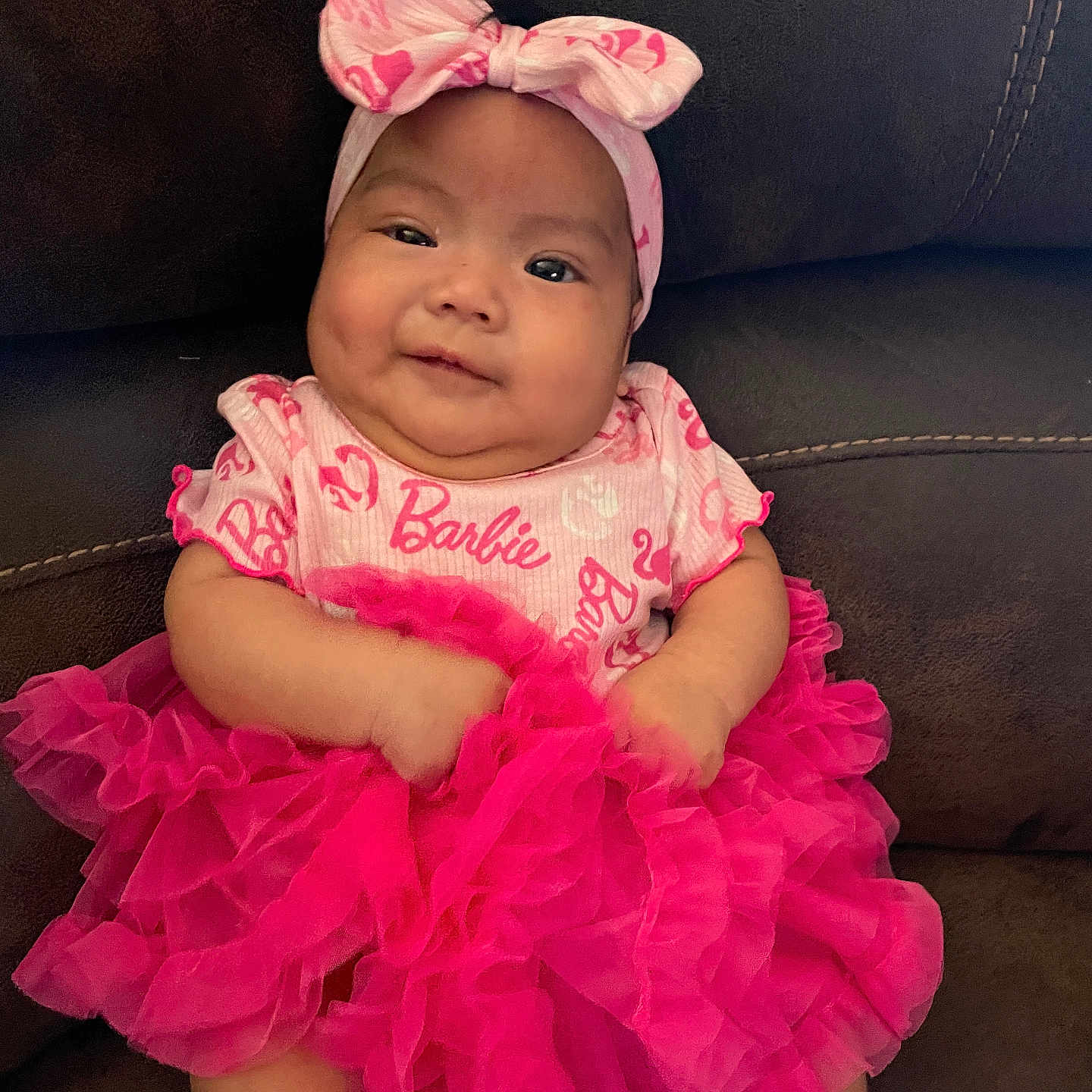 Yelitza is registered to the contest to win money with this photo: baby, bonnet, cap, clothing, costume, couch, dress, eveningdress, face, flower, formalwear, furniture, hat, head, person, photography, plant, portrait, sitting, skirt