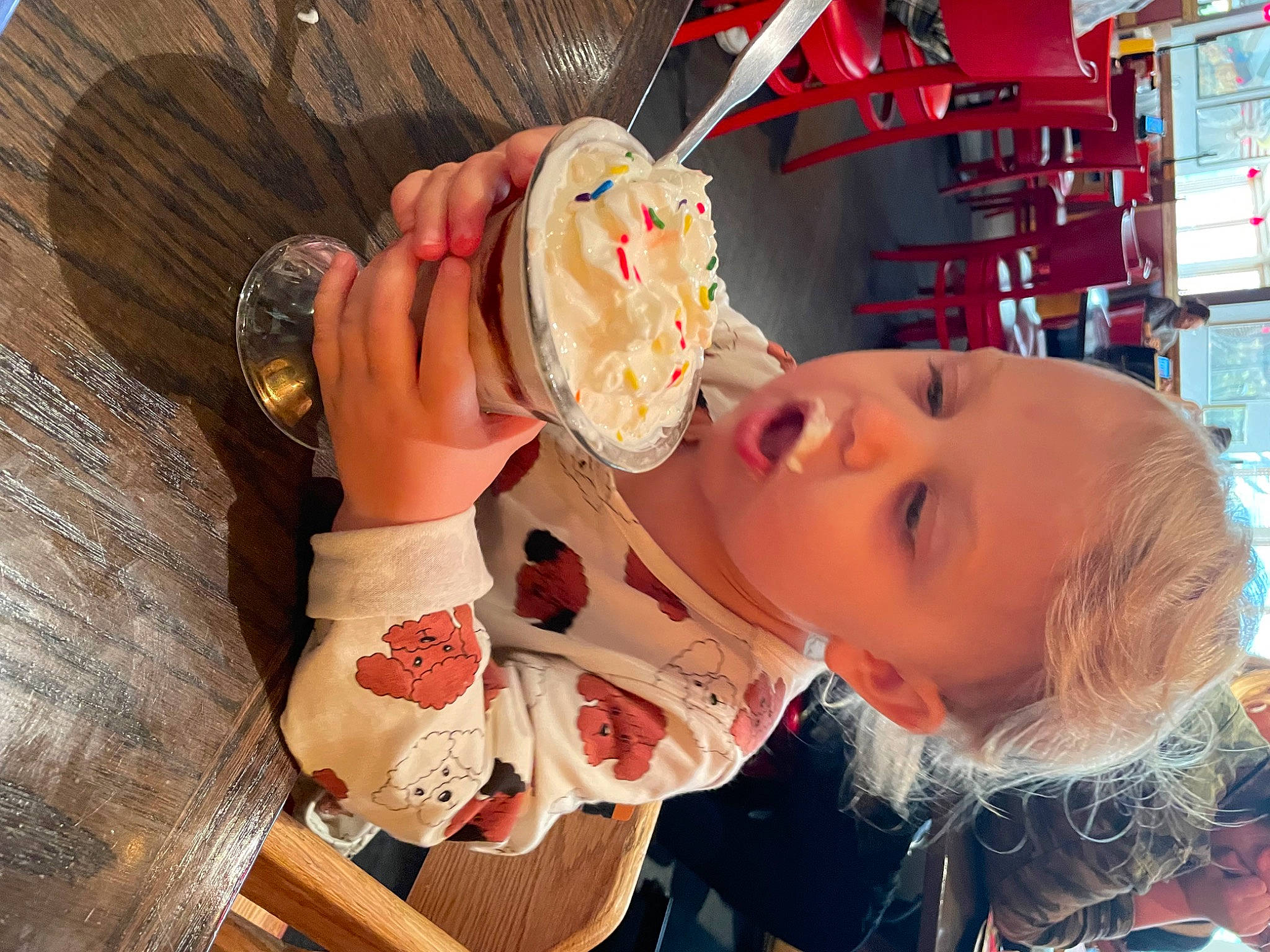 Phoenix is registered to the contest to win money with this photo: baby, child, comfort_food, cuisine, dish, eating, fast_food, finger_food, food, food_craving, fun, ingredient, junk_food, orange, peach, person, plate, sandwich, sweetness, tableware