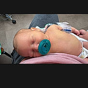 Julius joined the competition — help win amazing prizes! baby, bed, blanket, child, clothing, cute, hand, hospital_band, human, indoor, infant, lap, newborn, pacifier, peaceful, person, rest, skin, sleeping, tender_moment