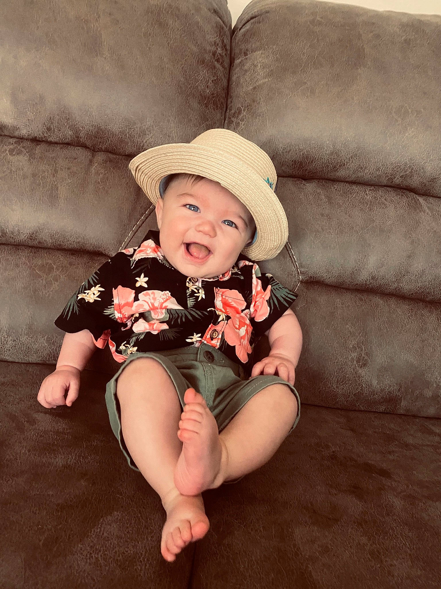 Corbin is registered to the contest to win money with this photo: baby, baby_toddler_clothing, comfort, couch, eye, fedora, flash_photography, flooring, happy, hat, headwear, human_body, knee, lip, person, shoulder, skin, sleeve, smile, sun_hat