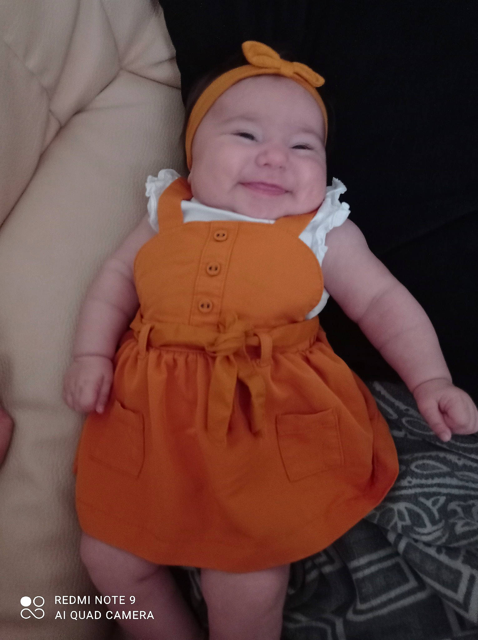 Madyson a rejoint le concours — aidez-le/la à gagner de superbes lots ! arm, baby, baby_toddler_clothing, cap, cheek, child, day_dress, dress, face, finger, hand, head, headgear, headwear, one_piece_garment, outerwear, person, pink, skin, sleeve