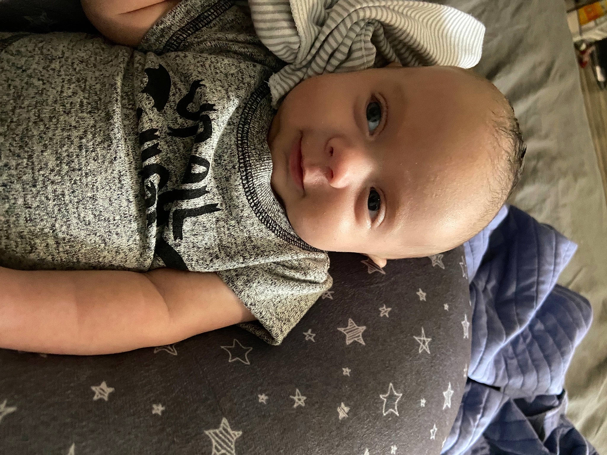 Logan joined the competition — help win amazing prizes! baby, baby_toddler_clothing, cheek, child, comfort, cool, eye, hand, happy, hat, iris, mouth, nose, pattern, person, skin, sleeve, smile, sun_hat, toddler