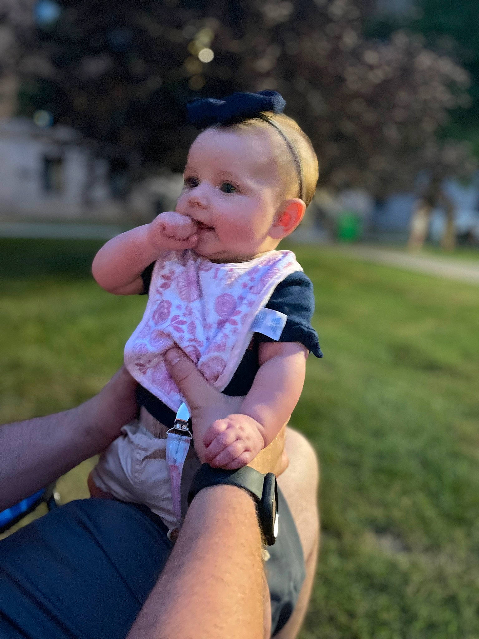 Gatlynn is registered to the contest to win money with this photo: baby, baby_toddler_clothing, child, flash_photography, fun, grass, happy, human_leg, knee, lap, leisure, person, plant, recreation, shorts, shoulder, sitting, thigh, toddler, tree