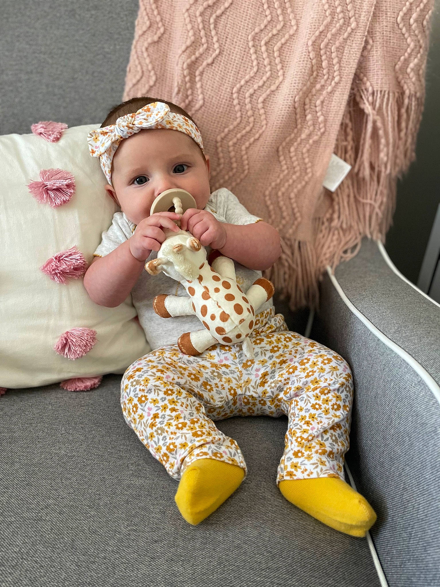 Gatlynn is registered to the contest to win money with this photo: baby, baby_sleeping, baby_toddler_clothing, blond, child, comfort, fawn, finger, foot, headwear, human_leg, knee, lap, pattern, person, sitting, skin, sleeve, textile, thigh