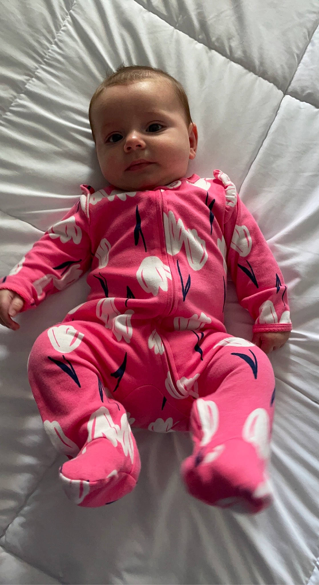 Gatlynn is registered to the contest to win money with this photo: baby, baby_toddler_clothing, carmine, cheek, child, comfort, face, facial_expression, happy, linens, magenta, outerwear, pattern, person, pink, sitting, skin, sleeve, smile, thumb