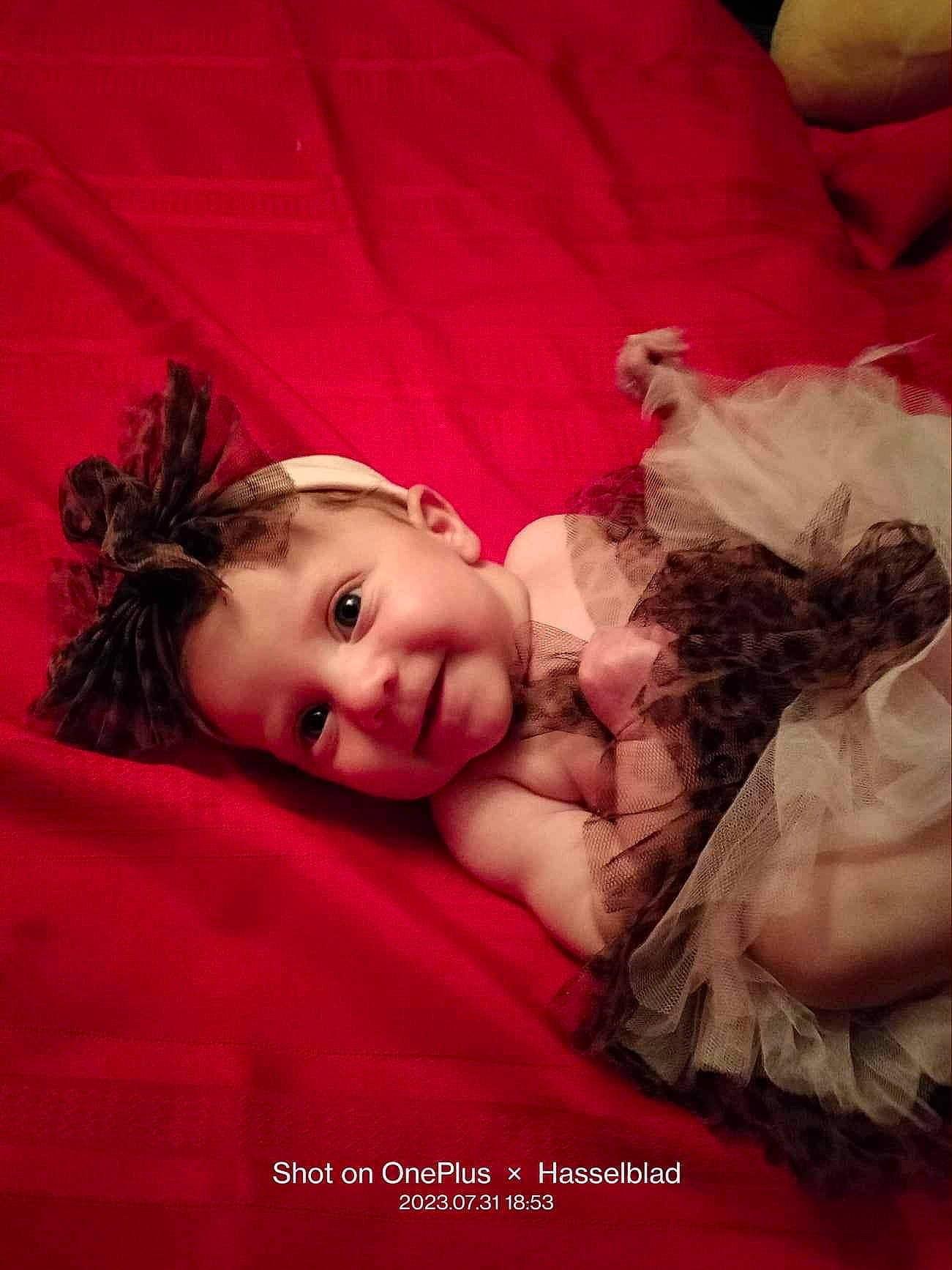 Willow joined the competition — help win amazing prizes! abdomen, baby, blond, brown_hair, child, comfort, couch, event, flash_photography, fun, hairstyle, happy, human_body, iris, lip, magenta, person, pink, skin, smile