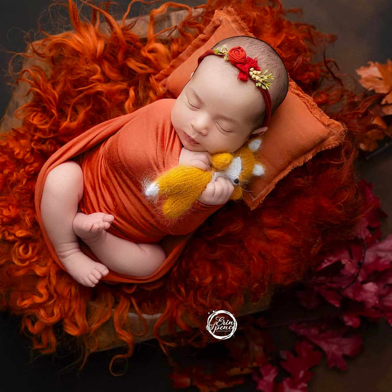 Ember joined the competition — help win amazing prizes! autumn_leaves, baby, blanket, cozy, curly_blanket, cute, flower_headband, headband, indoor, infant, newborn, orange_wrap, peaceful, pillow, portrait, sleeping, soft_lighting, stuffed_toy, swaddled, yellow_fox