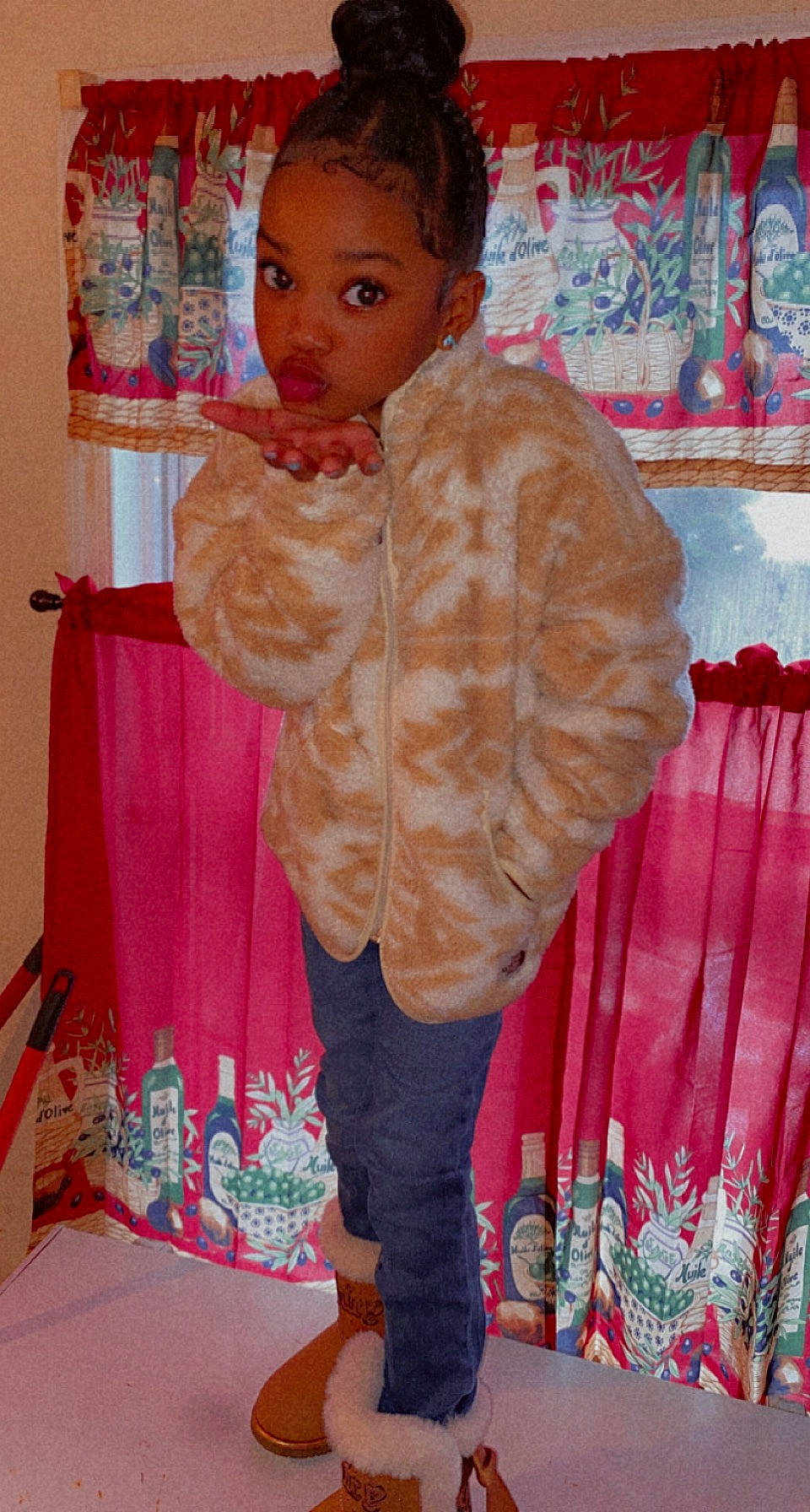 Promyse is registered to the contest to win money with this photo: baby_toddler_clothing, bag, child, costume, fashion, fashion_accessory, fashion_design, flooring, fur, linens, luggage_and_bags, magenta, orange, pattern, peach, person, pink, room, sleeve, surprise