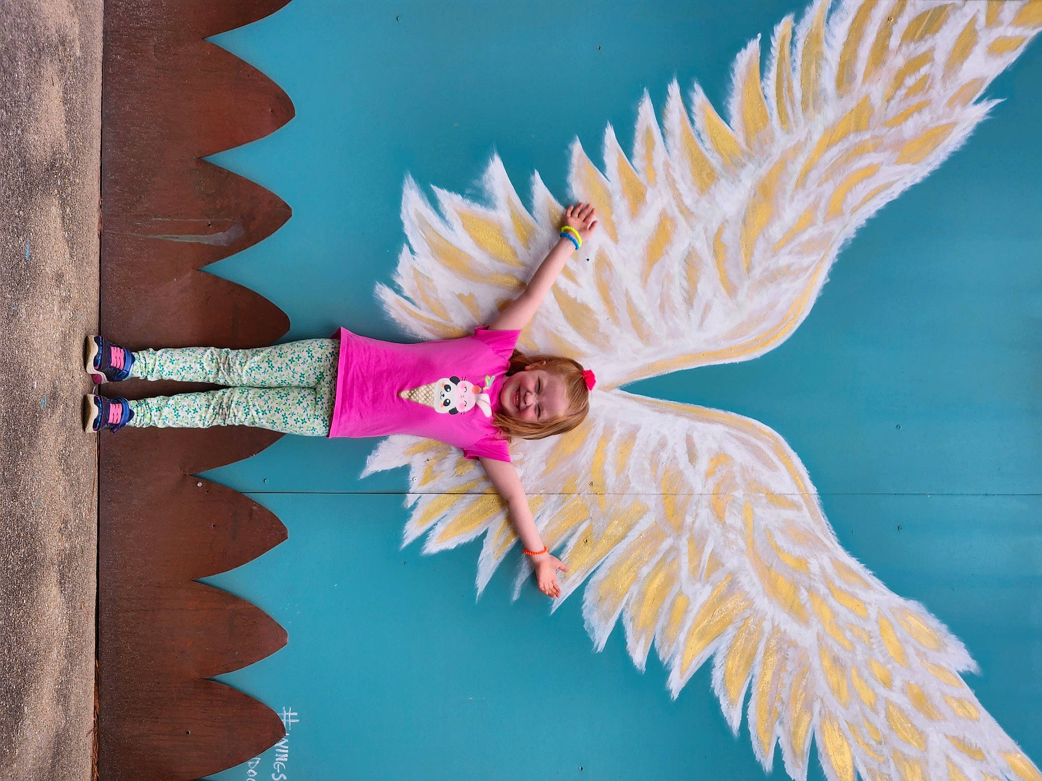 Camilla is registered to the contest to win money with this photo: advertising, art, azure, electric_blue, fashion_accessory, feather, fish, font, gesture, graphics, illustration, joy, marine_biology, mural, organism, painting, person, pink, underwater, visual_arts