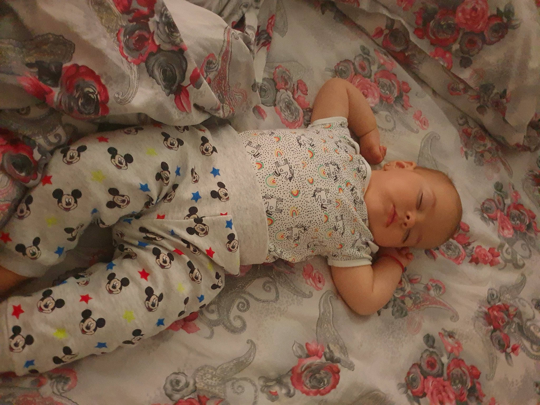 Cassandra is registered to the contest to win money with this photo: baby, baby_safety, baby_sleeping, baby_toddler_clothing, bed, bedding, child, comfort, dress, flooring, hand, human_body, linens, pattern, person, pink, skin, sleeve, t_shirt, textile
