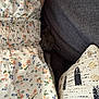 animal, cat, couch, cozy, cute, fabric, floral_dress, gray_cat, hidden, home, indoor, kitten, pattern, pet, pillow, relaxation, resting, sleepy, small_animal, soft_texture