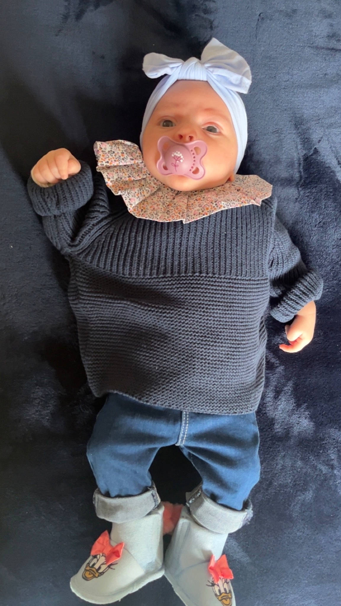 Tyana a rejoint le concours — aidez-le/la à gagner de superbes lots ! baby, baby_toddler_clothing, cap, cheek, child, cool, electric_blue, face, fun, gesture, happy, head, headgear, headwear, outerwear, person, personal_protective_equipment, skin, sleeve, smile