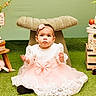 Legacie joined the competition — help win amazing prizes! toddler, child, dress, pink_bow, lace, grass, easter_eggs, decor, crate, basket, flower, headband, indoor, portrait, cute, holiday, celebration, sitting, face, person