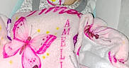 Amelia joined the competition — help win amazing prizes! baby, sleeping, infant, pacifier, blanket, pink, butterflies, portrait, cozy, nursery, bedding, patterned, seated, indoors, relaxed, cute, face, head, child, textile