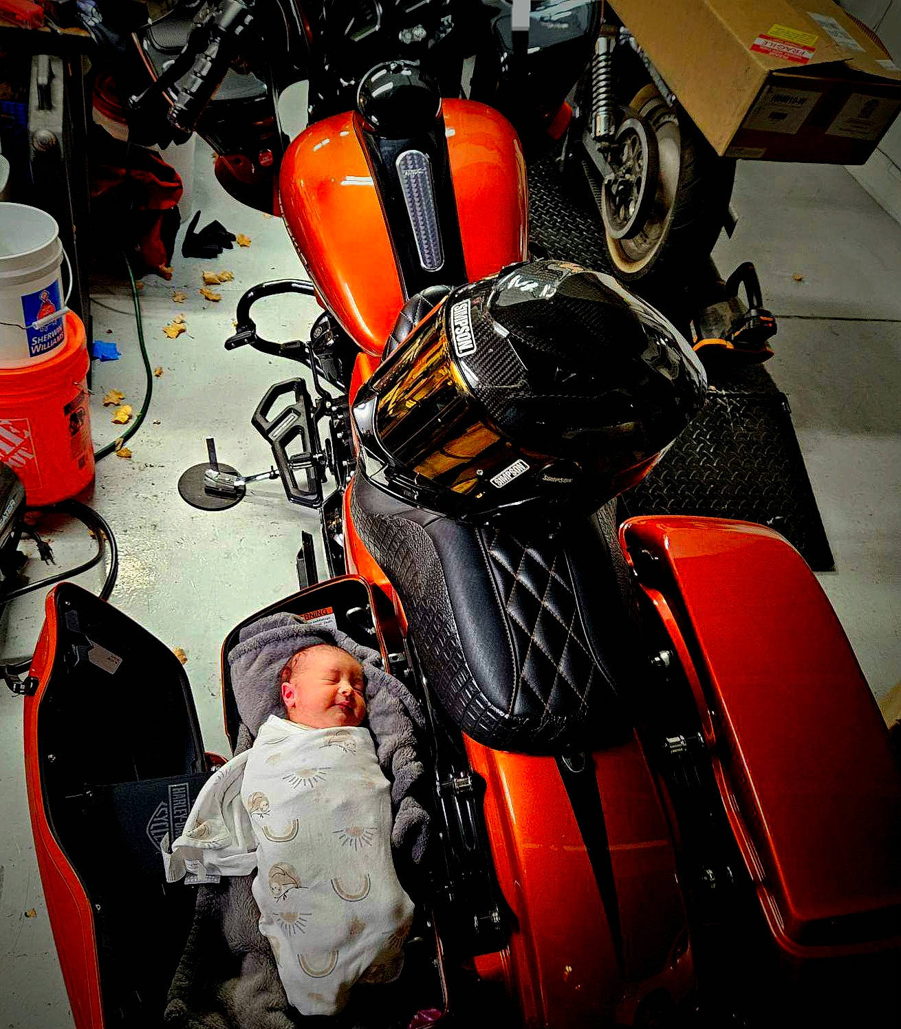 Aria joined the competition — help win amazing prizes! alloywheel, baby, box, clothing, face, glove, hardhat, head, helmet, machine, motor, motorcycle, person, photography, portrait, sleeping, spoke, transportation, vehicle, wheel