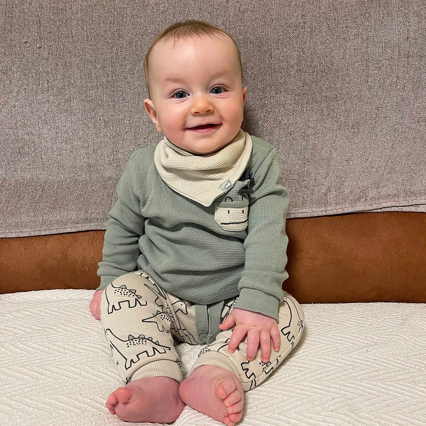 Bertie joined the competition — help win amazing prizes! baby, babylaughing, bodypart, clothing, couch, cushion, face, finger, furniture, hand, happy, head, homedecor, jeans, pants, person, photography, portrait, sitting, smile