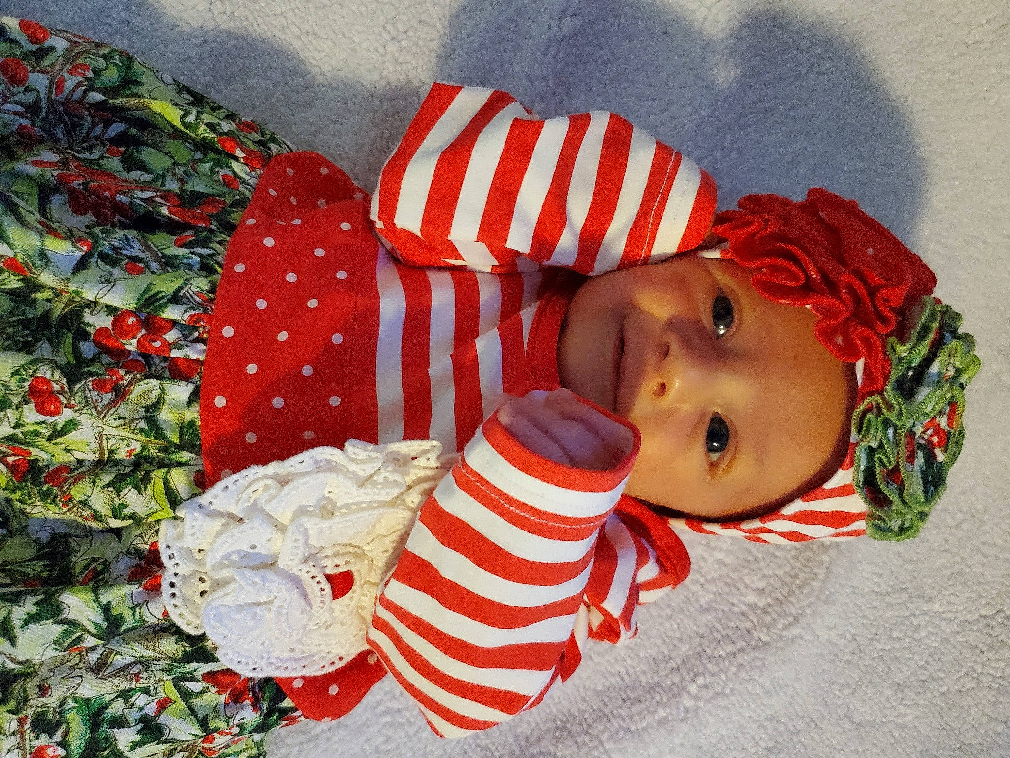 Korra joined the competition — help win amazing prizes! baby, baby_toddler_clothing, christmas, christmas_decoration, christmas_eve, conifer, costume, costume_accessory, fir, headwear, holiday, person, pine, pine_family, red, toddler