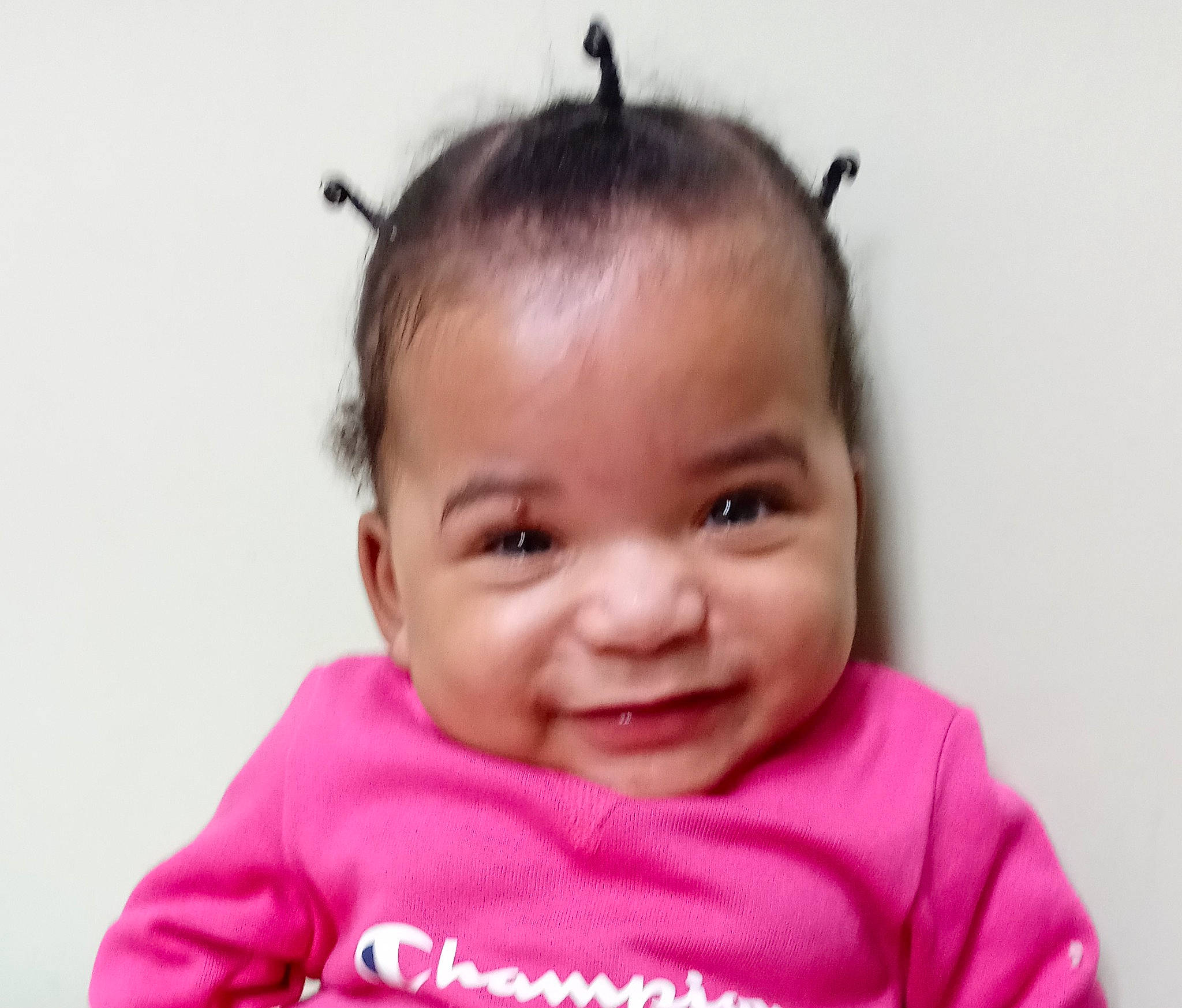 Piper is registered to the contest to win money with this photo: baby, baby_toddler_clothing, cheek, child, chin, collar, ear, eyelash, fashion_accessory, hair, happy, head, joy, magenta, person, portrait_photography, skin, sleeve, smile, toddler