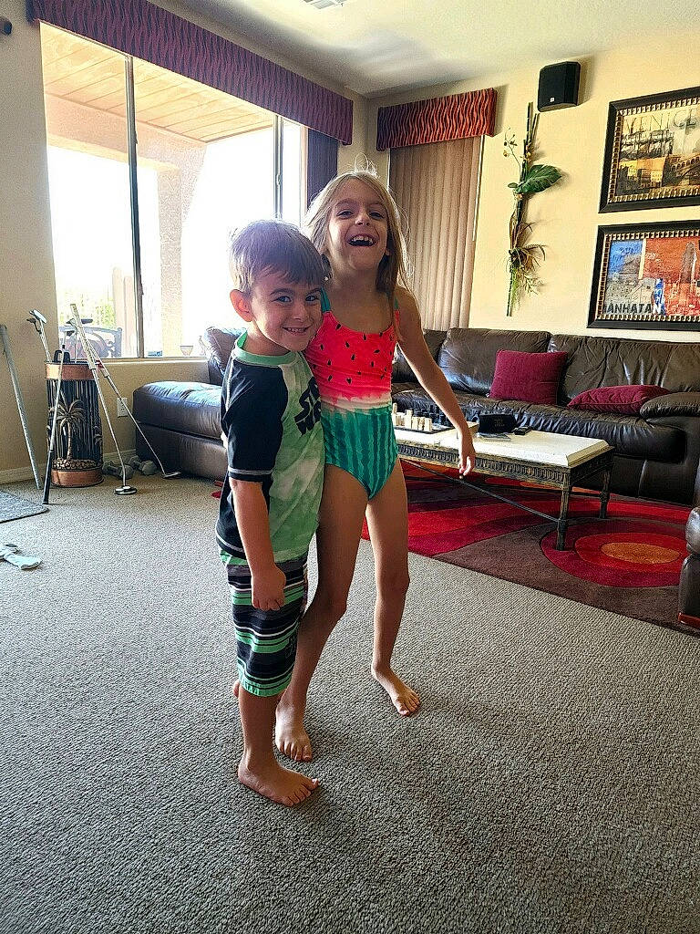 Landon joined the competition — help win amazing prizes! balance, barefoot, couch, curtain, event, floor, flooring, foot, fun, hair, happy, houseplant, human_leg, joy, leisure, person, picture_frame, shoulder, smile, television