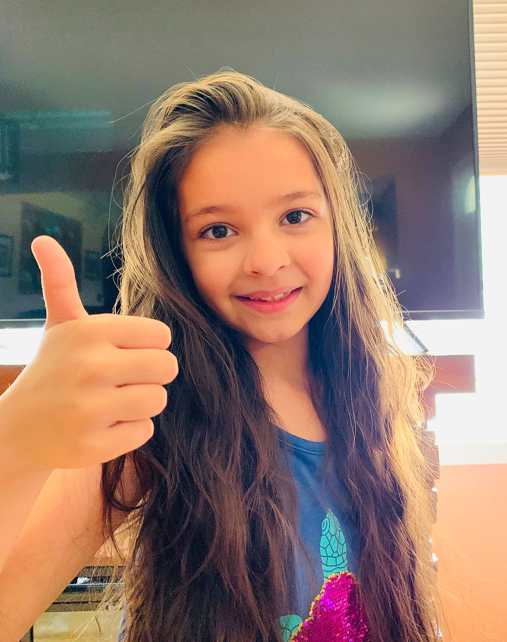 Angelique is registered to the contest to win money with this photo: arm, cheek, chin, cool, eyebrow, eyelash, facial_expression, finger, gesture, hair, hairstyle, hand, happy, human, iris, joy, lip, neck, person, shoulder