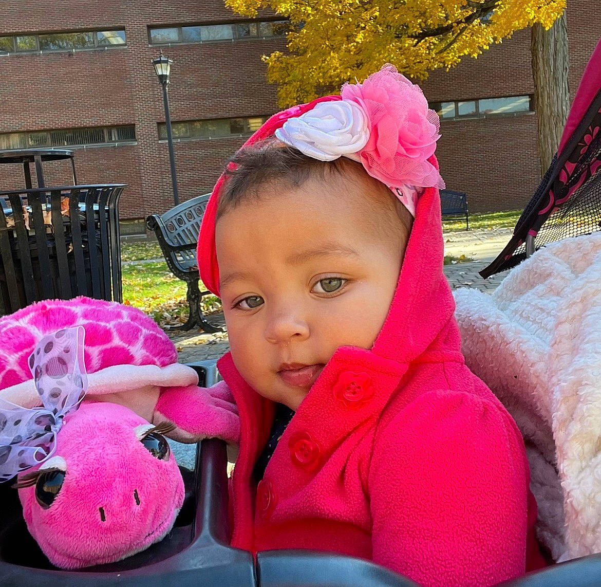 Wynter joined the competition — help win amazing prizes! baby, baby_products, cap, child, fashion_accessory, fun, grass, happy, headgear, leisure, magenta, person, personal_protective_equipment, pink, plant, recreation, steering_wheel, stuffed_toy, toddler, toy