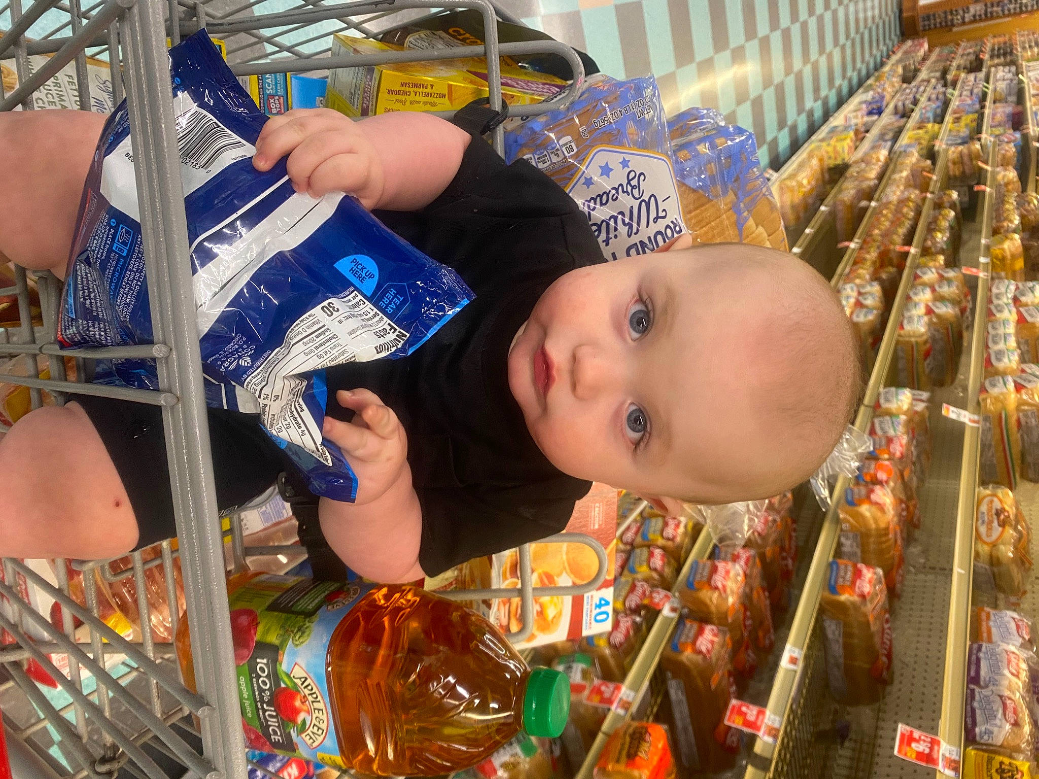 Kingsley is registered to the contest to win money with this photo: baby, child, city, fun, leisure, market, marketplace, person, retail, room, supermarket, textile, toddler, toy, wood