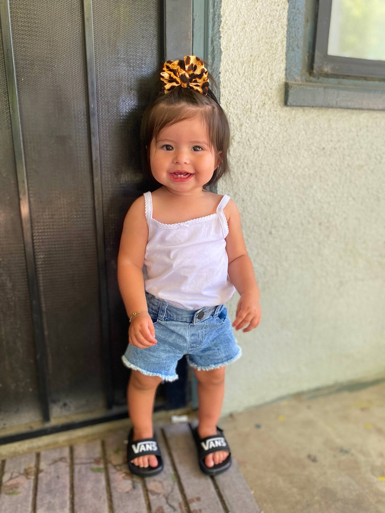 Brielle joined the competition — help win amazing prizes! baby_toddler_clothing, denim, door, face, footwear, happy, hat, head, human_leg, jeans, joy, person, shoe, shorts, skin, sleeve, smile, standing, thigh, toddler
