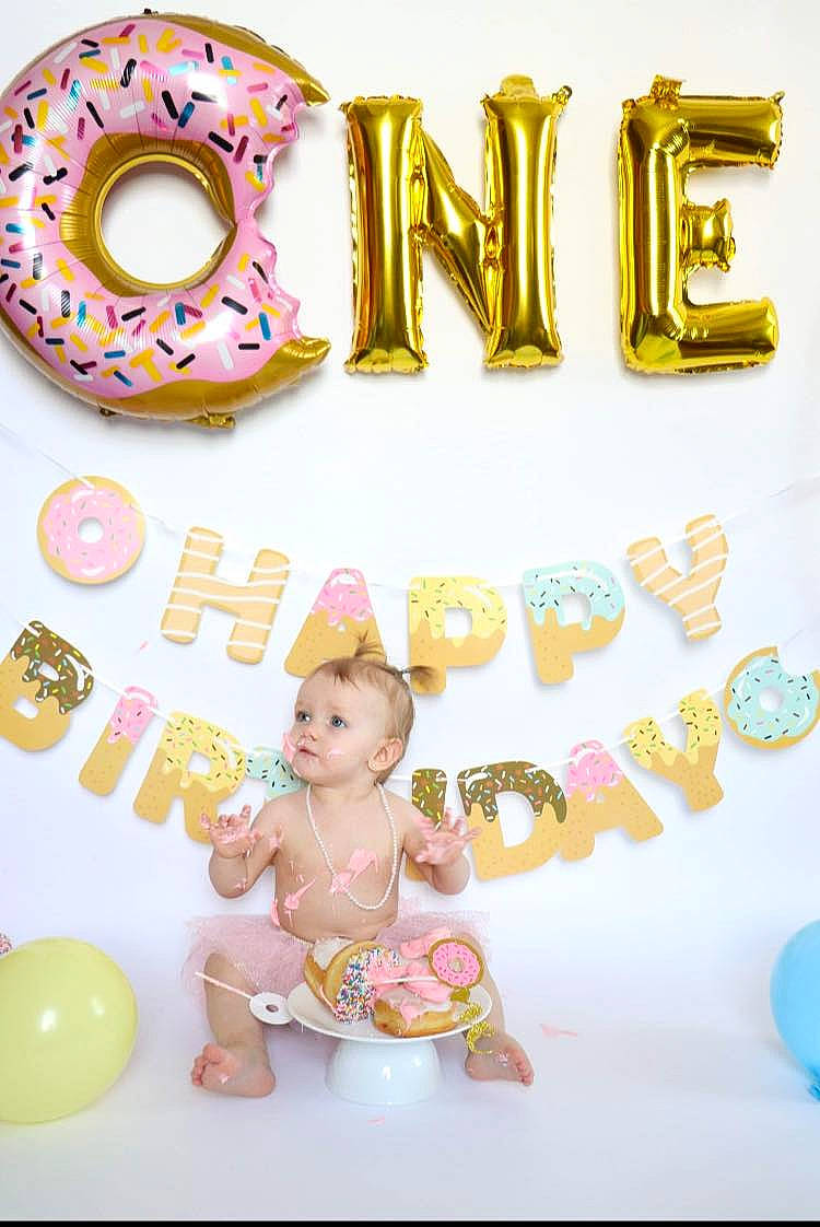 Layla-rose is registered to the contest to win money with this photo: baby, baby_products, baby_toys, balloon, birthday, child, event, font, number, party, party_supply, person, pink, play, product, room, toddler, wheel, yellow