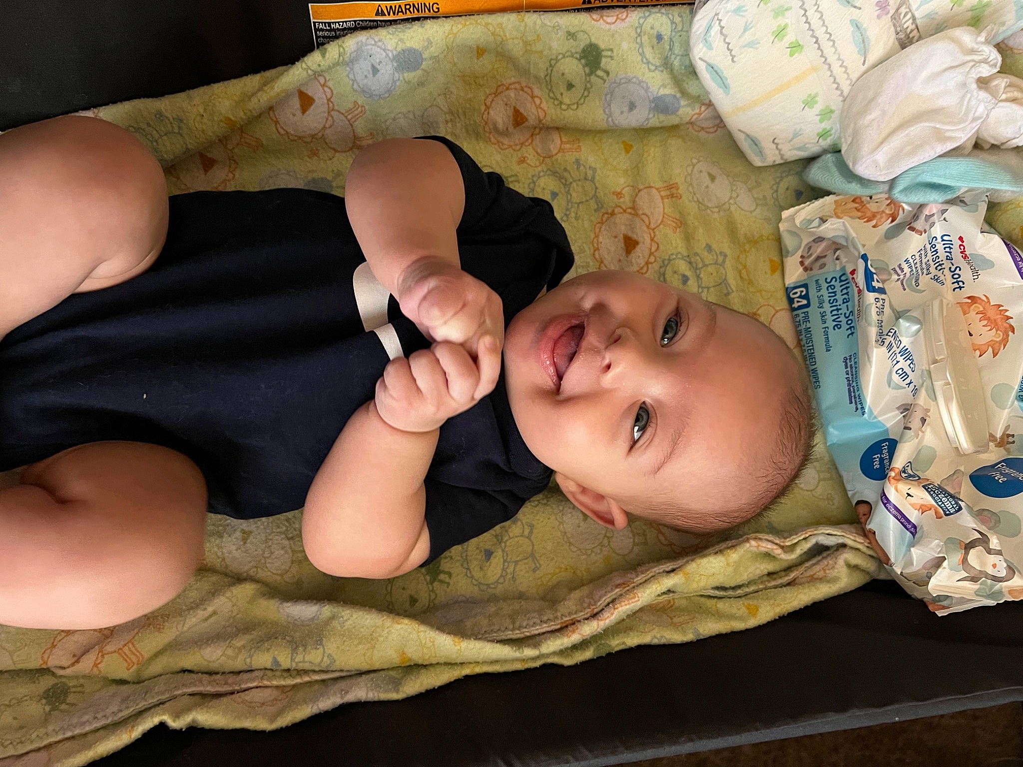 Amelia joined the competition — help win amazing prizes! baby, baby_toddler_clothing, cheek, child, chin, comfort, eye, face, finger, head, human_body, iris, linens, mouth, nose, person, skin, smile, thumb, toddler