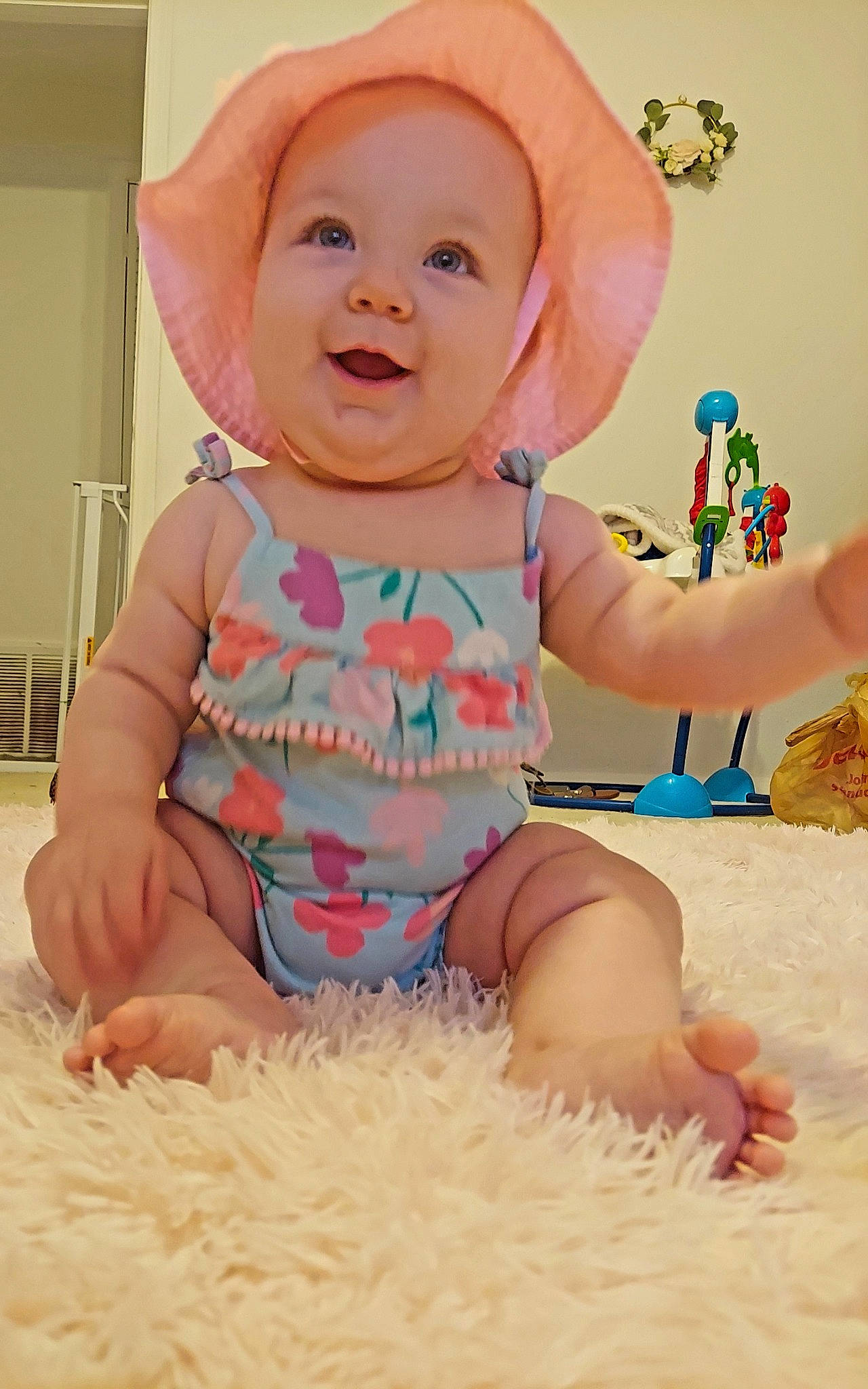 Evangeline joined the competition — help win amazing prizes! baby, baby_toddler_clothing, cheek, child, comfort, facial_expression, finger, fun, happy, head, mouth, person, photograph, pink, product, sitting, skin, sleeve, smile, thigh