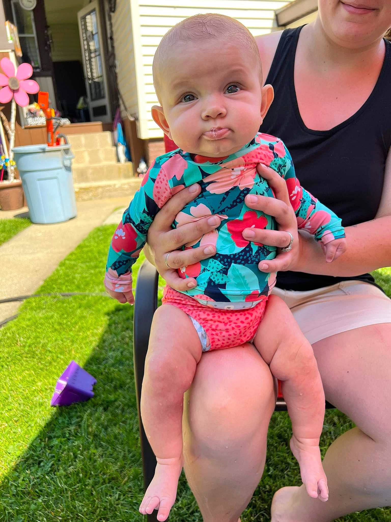 Braylee joined the competition — help win amazing prizes! baby, baby_toddler_clothing, blue, child, fun, grass, green, happy, human_leg, lap, leg, leisure, person, pink, plant, skin, summer, swimwear, thigh, toddler