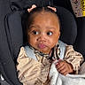 Khadidja Ifeoma a rejoint le concours — aidez-le/la à gagner de superbes lots ! adorable, baby, blanket, car_seat, child, clothing, curly_hair, cute, expression, indoor, infant, light_and_shadow, looking_away, pink_bows, portrait, safety, seatbelt, sitting, soft_texture, transportation