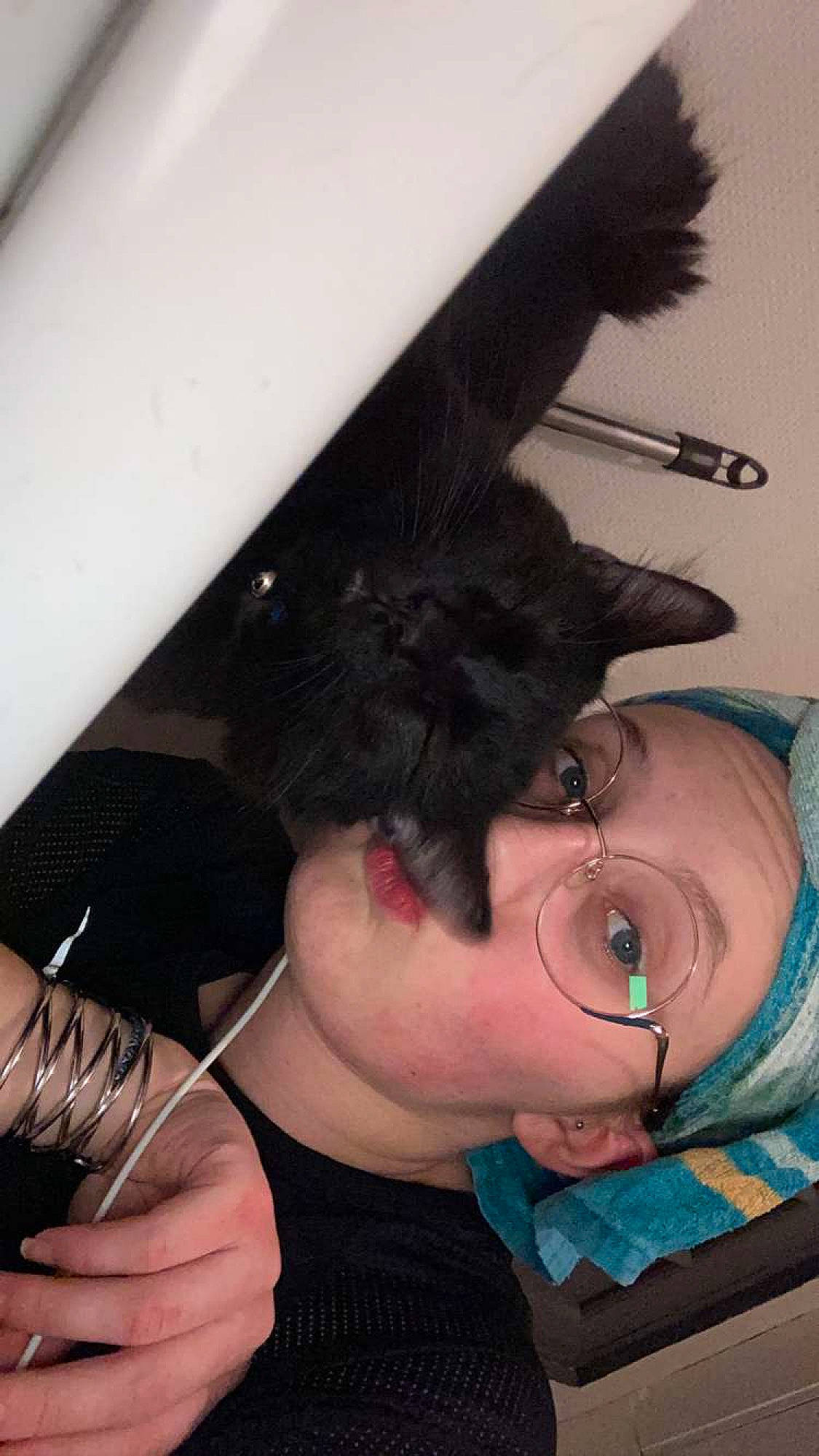 Cincinnati participe au concours pour gagner de l'argent avec cette photo : audio_equipment, black_hair, chest, ear, eyebrow, eyelash, eyewear, fashion_accessory, finger, gesture, glasses, jaw, long_hair, neck, shoulder, skin, throat, vision_care, whiskers, wrist