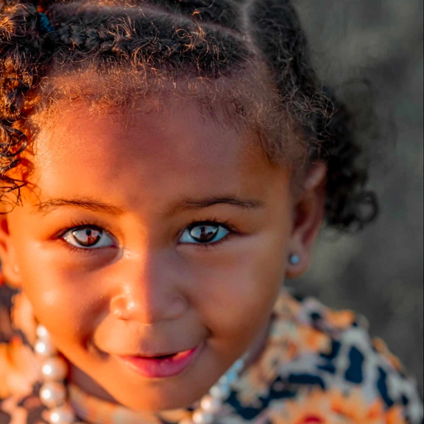 Zoey is registered to the contest to win money with this photo: blackhair, bodypart, braid, child, cornrows, dimples, face, female, girl, hair, happy, head, person, shoulder, skin, smile