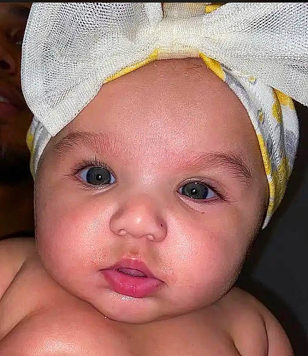 Maelani is registered to the contest to win money with this photo: baby, cheek, chin, ear, eye, eyebrow, eyelash, forehead, hairstyle, happy, headgear, headwear, human_body, iris, lip, mouth, neck, nose, organ, person