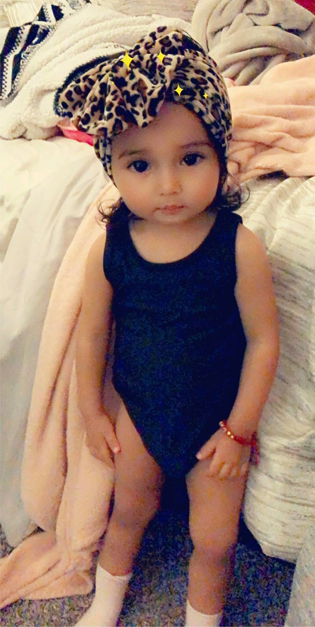 America joined the competition — help win amazing prizes! baby, beanie, cap, child, child_model, clothing, fashion_accessory, hair_accessory, headgear, headpiece, headwear, person, toddler