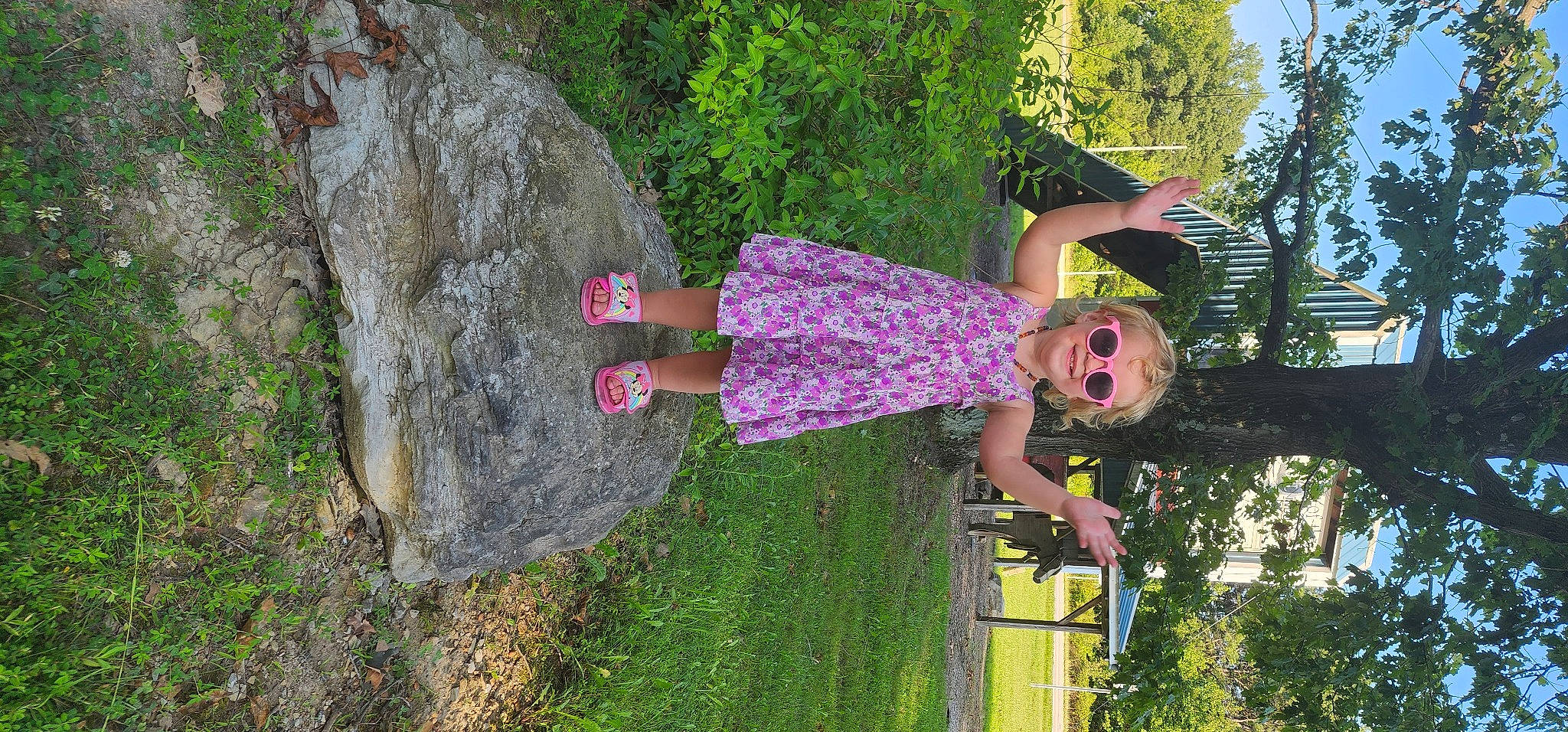 Lillian joined the competition — help win amazing prizes! bedrock, fun, grass, groundcover, happy, hat, joy, leisure, magenta, people_in_nature, person, plant, recreation, shrub, smile, thigh, tree, trunk