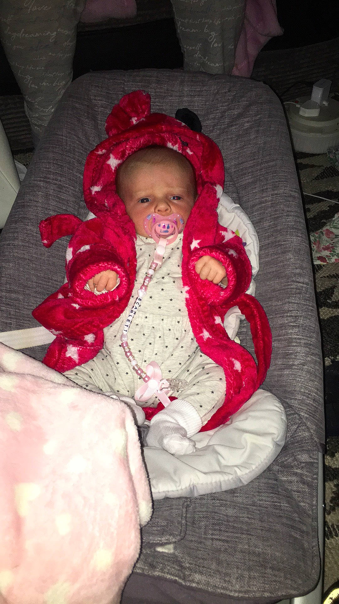 Scarlett is registered to the contest to win money with this photo: baby, baby_carriage, baby_products, baby_toddler_clothing, chair, cheek, child, comfort, event, eye, face, human_body, iris, lap, lip, mammal, outerwear, person, sitting, skin