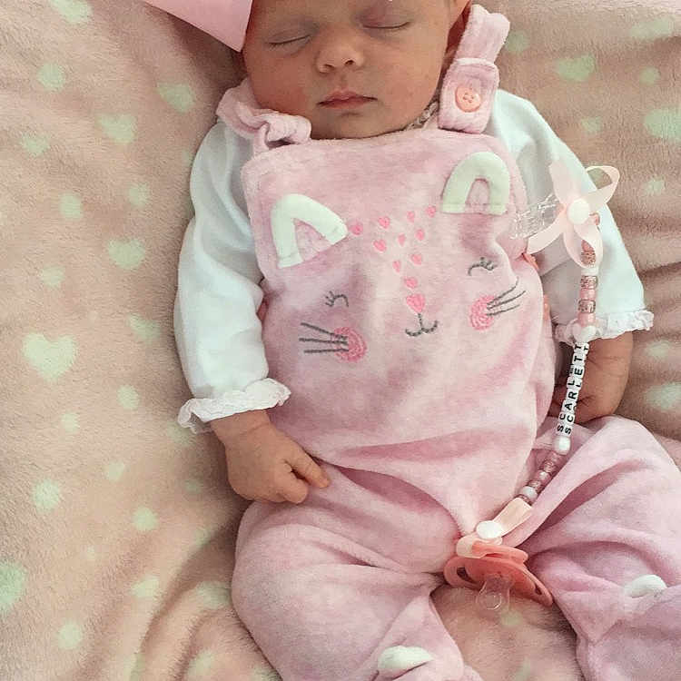 Scarlett is registered to the contest to win money with this photo: baby, baby_products, baby_toddler_clothing, baseball_cap, cap, carmine, cheek, child, comfort, face, happy, linens, pattern, peach, pink, product, skin, sleeve, textile, toddler