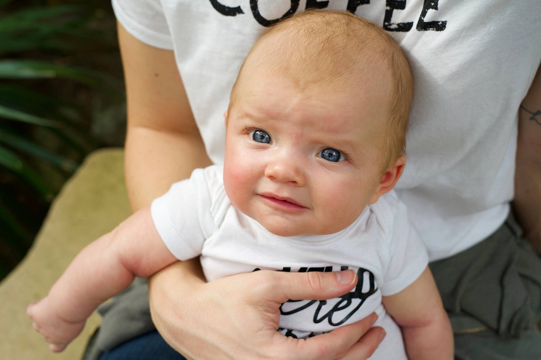 Britta joined the competition — help win amazing prizes! arm, baby, baby_products, baby_toddler_clothing, cheek, child, event, eye, finger, fun, gesture, grass, happy, nail, person, plant, sitting, skin, smile, thumb