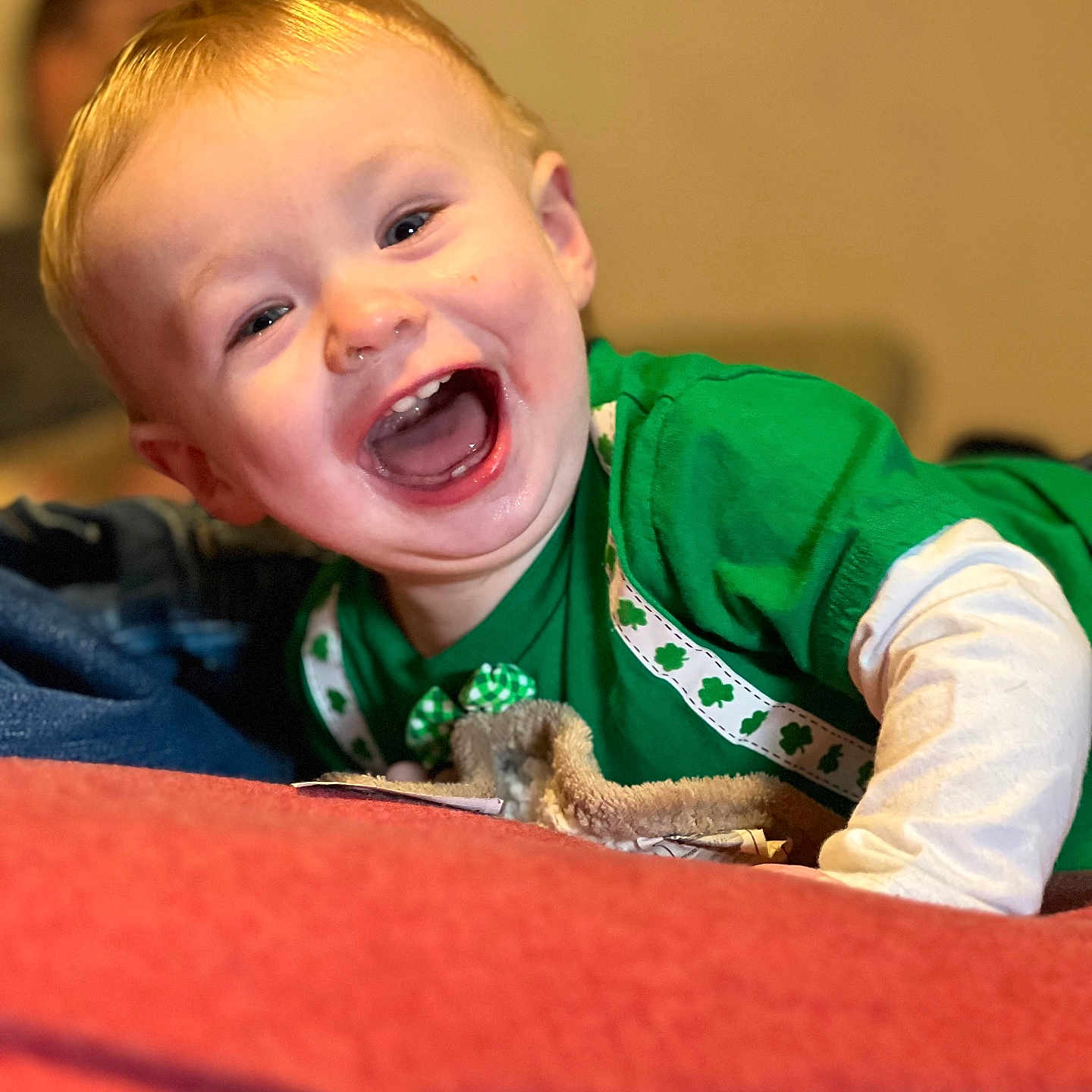 Thatcher joined the competition — help win amazing prizes! baby, babylaughing, bodypart, clothing, couch, face, finger, furniture, hand, happy, head, laughing, mouth, person, photography, portrait, shirt, smile, t_shirt, teeth
