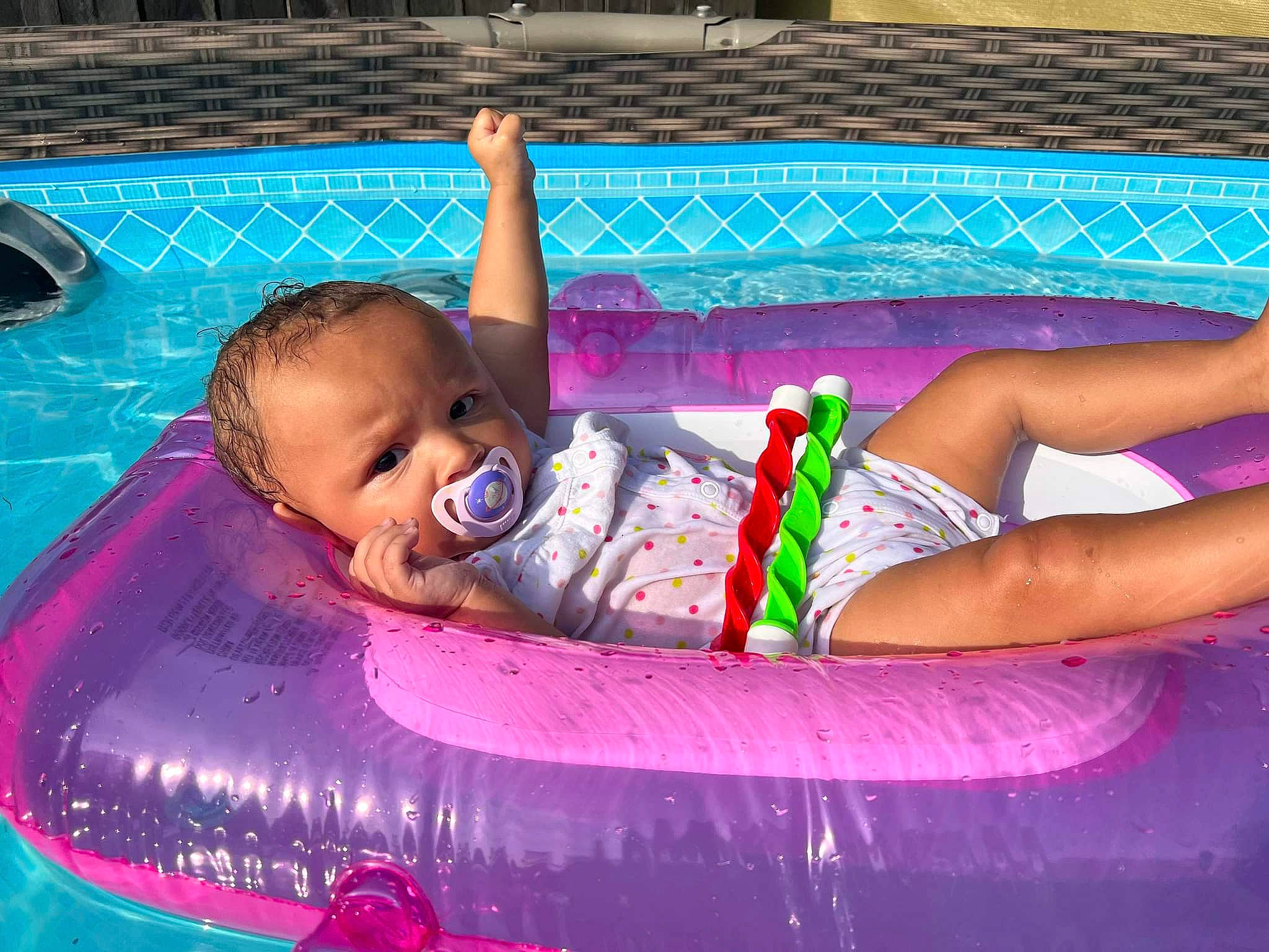 Hayven is registered to the contest to win money with this photo: baby_float, bathing, beauty, child, face, fun, happy, inflatable, leisure, magenta, person, photograph, pink, purple, recreation, red, snapshot, summer, thigh, toddler