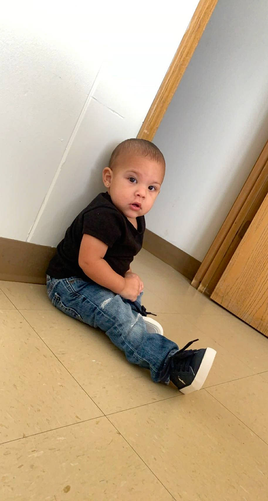 Bakari joined the competition — help win amazing prizes! baby, baby_toddler_clothing, comfort, composite_material, elbow, flash_photography, floor, flooring, hardwood, knee, laminate_flooring, leg, pattern, person, sitting, sleeve, standing, surprise, t_shirt, toddler