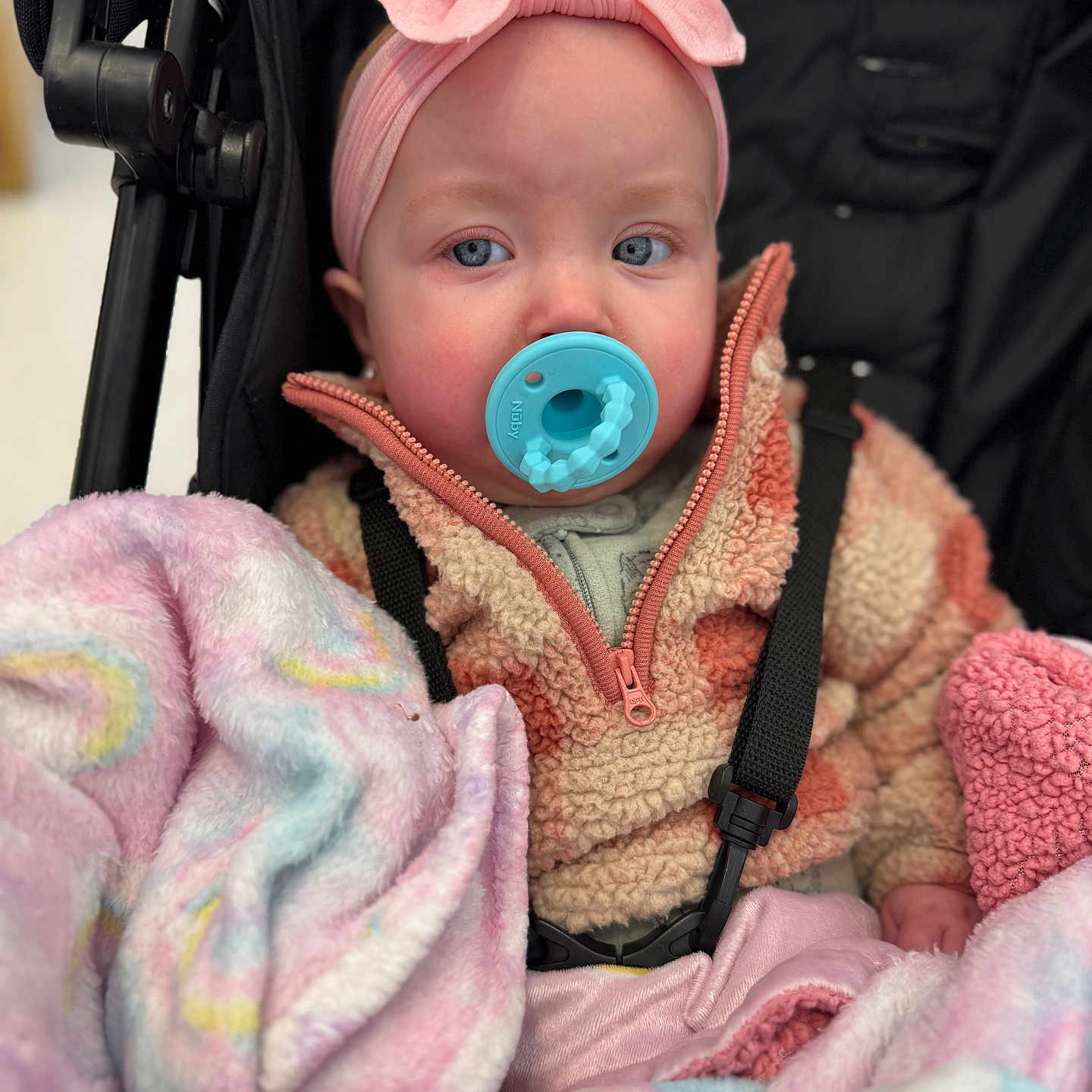 Haislee joined the competition — help win amazing prizes! baby, bodypart, bonnet, cap, clothing, coat, face, finger, hand, hat, head, hood, hoodie, jacket, knitwear, newborn, person, photography, portrait, sweater